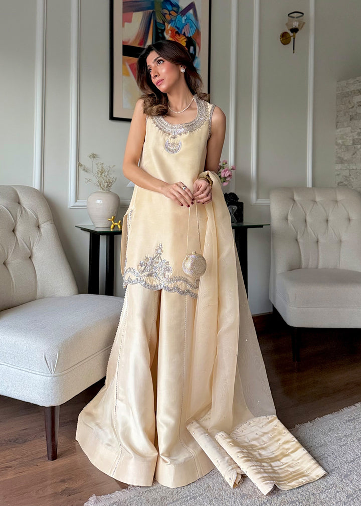 Butter yellow sleeveless formal dress with silver embroidery